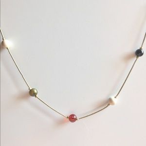 Faux gold necklace with subtle bead details